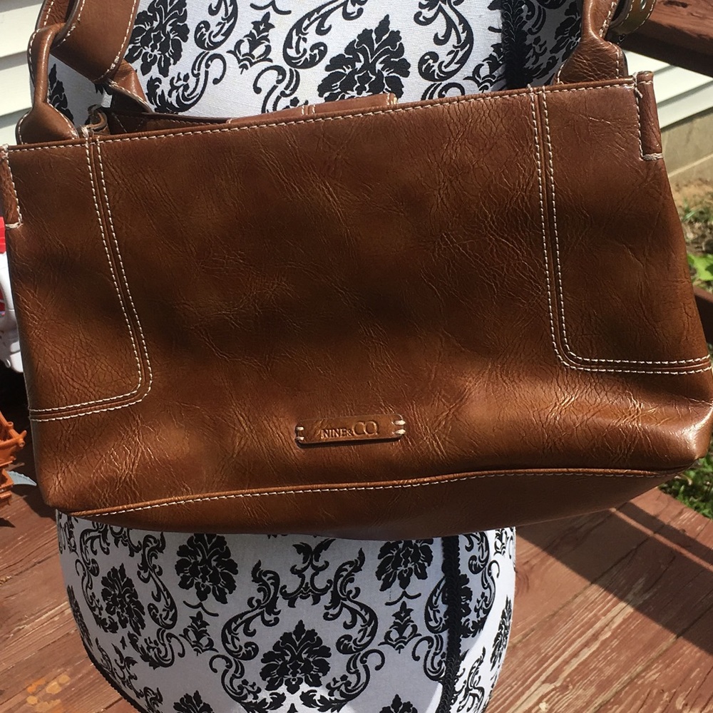 Very sheer NINE &CO purse